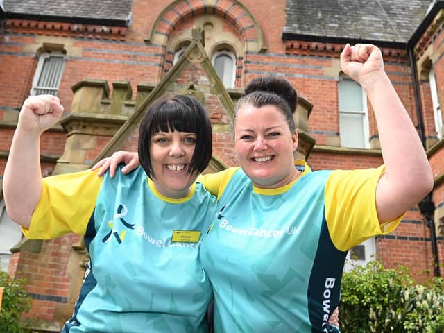 Wigan Infirmary staff Debbie Paterson, who walked 100 miles during Bowel Cancer Awareness Month, and Carley Mercer, who ran 60 miles