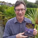 Frank Malley with his latest novel, The Killing Circle