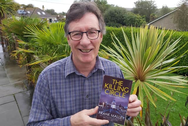 Frank Malley with his latest novel, The Killing Circle
