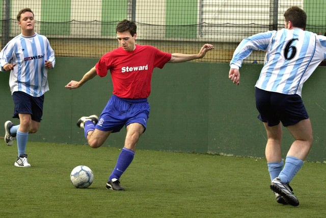 Leigh MP, Andy Burnham, lets fly at goal, as a team of MPs and councillors play against the WISH FM team, in a charity 5-a-side match at the JJB Soccerdome on Wednesday 20th of August 2003.