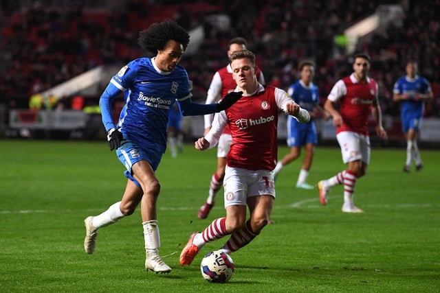 BRISTOL, ENGLAND - JANUARY 14: Tahith Chong of Birmingham City runs with the ball under pressure from Cameron Pring of Bristol City during the Sky Bet Championship match between Bristol City and Birmingham City at Ashton Gate on January 14, 2023 in Bristol, England. (Photo by Alex Burstow/Getty Images)