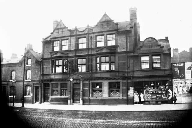 The Bowling Green pub on Wigan Lane with gentlemen's hair cutting and shaving saloon attached at the turn of the 20th century.