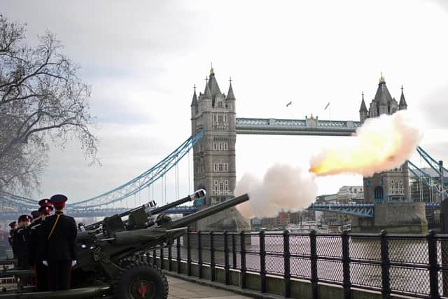 Members of the Honourable Artillery Company fire a gun salute from the wharf at the Tower of London to mark the official start of the Platinum Jubilee. Picture date: Monday February 7, 2022.