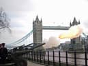 Members of the Honourable Artillery Company fire a gun salute from the wharf at the Tower of London to mark the official start of the Platinum Jubilee. Picture date: Monday February 7, 2022.