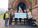 Councillors hand over the cheque