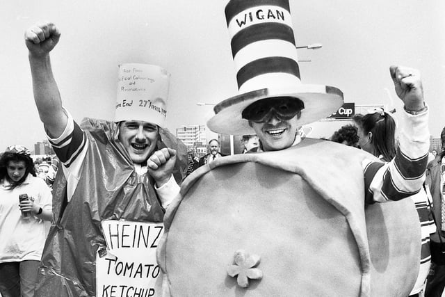 Warriors fans celebrate being at Wembley.
