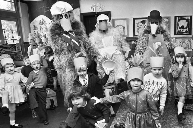 The Wombles join the Christmas Party at Beech Hill Infants School in December 1975.