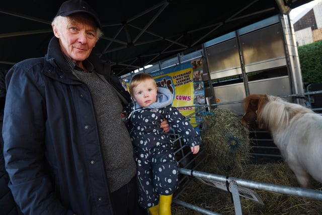 Andrew Sharples with grandson 18-month-old Jack, meet animals from All Days Farm, part of the Living Nativity.