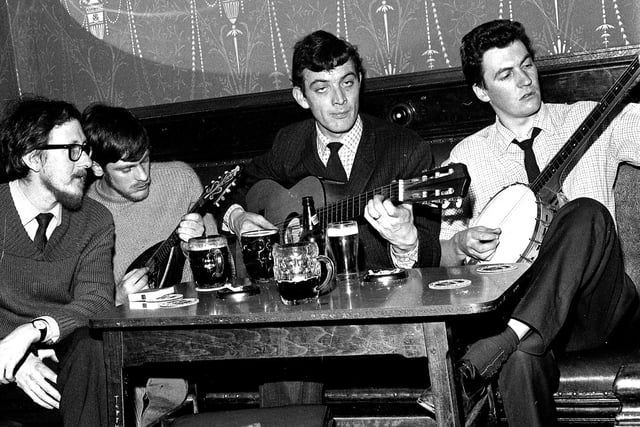 1969 Jake Thakray joining local folk fans at Wigan's Park Hotel .