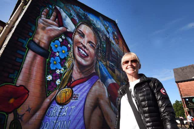 Proud mum Rachel Hodgkinson stands next to her daughter's mural