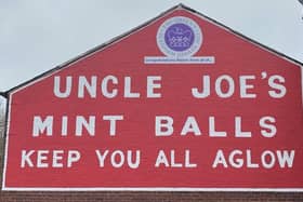The royal goodwill message on the gable end of the William Santus factory in Dorning Street
