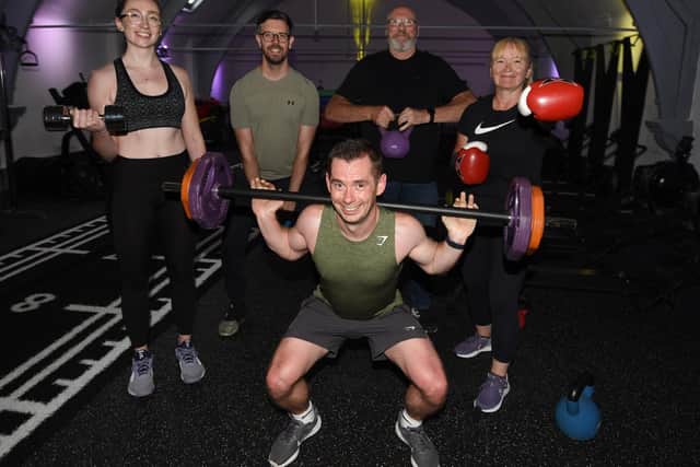 A group of friends, from left, Jess Heaton, Ian Taylor, David Ratchford (front centre) Chris Taylor and Liz Wilson,  are preparing for a five-hour bootcamp, raising funds for friend Joanne, who has terminal cancer