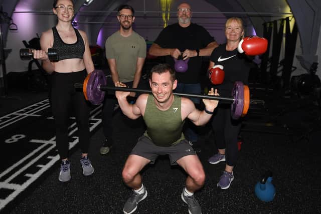 A group of friends, from left, Jess Heaton, Ian Taylor, David Ratchford (front centre) Chris Taylor and Liz Wilson, are preparing for a five-hour bootcamp, raising funds for friend Joanne, who has terminal cancer