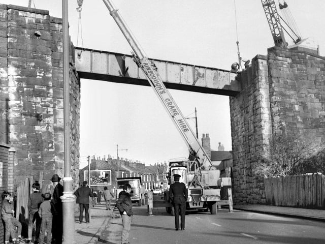 The demolition of the century old Tippings railway bridge on Poolstock Lane in January 1971.The bridge carried the old Pemberton loop line.