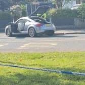 A damaged car on Bolton Road, Ashton after the crash