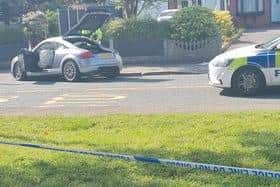 Investigation under way after car being pursued by police in Wigan hits ...