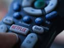 Netflix is launching the sub-account model soon, and a cheaper subscription package next month. Picture: Chris DELMAS/AFP via Getty Images.