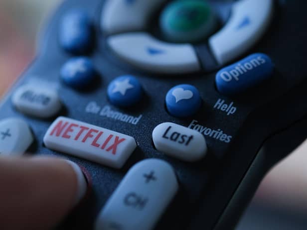 Netflix is launching the sub-account model soon, and a cheaper subscription package next month. Picture: Chris DELMAS/AFP via Getty Images.