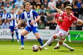 Jensen Weir puts himself about in the midfield against Wrexham