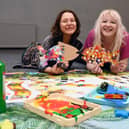 Wigan artists Ellie Leigh, left, and  Anna FC Smith,  at the free toddler orientated art workshop and messy play session, taking inspiration from Seeing Things exhibition, at The Edge, Wigan.