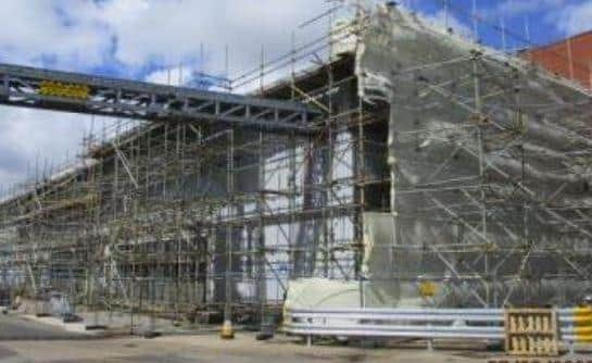 The cookhouse at the Kitt Green Heinz factory surrounded by scaffolding