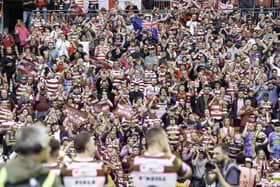 Warriors supporters celebrate the Wembley win with the players