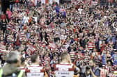 Warriors supporters celebrate the Wembley win with the players