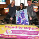 Pub regulars and members of the community have been taking turns to cycle part of the month-long challenge: a 1,206-mile journey which is the distance from Land's End to John O'Groats and bac, on static bikes at The Hawk Pub, Hawkley Hall,  raising funds for Wigan and Leigh Hospice.  Pub manager Claire Bolton, centre, is pictured with Dave Parry, left, and Derek McCabe, right