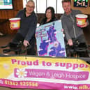 Pub regulars and members of the community have been taking turns to cycle part of the month-long challenge: a 1,206-mile journey which is the distance from Land's End to John O'Groats and bac, on static bikes at The Hawk Pub, Hawkley Hall,  raising funds for Wigan and Leigh Hospice.  Pub manager Claire Bolton, centre, is pictured with Dave Parry, left, and Derek McCabe, right