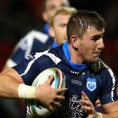 Adam Walker in action for Scotland