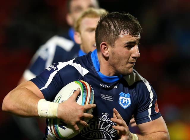 Adam Walker in action for Scotland