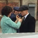 A make-up touch-up for Cillian Murphy, aka Tommy Shelby