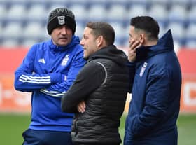 Leam Richardson, with former Latics colleagues Paul Cook and Gary Roberts