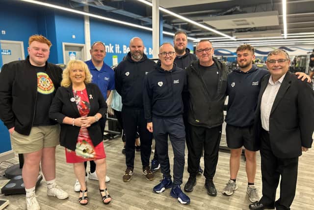 Paul Sutton returns to Robin Park gym to thank staff who saved his life
