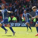 Yanic Wildschut scores at Blackpool to help seal promotion for Latics in 2015-16
