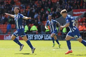 Yanic Wildschut scores at Blackpool to help seal promotion for Latics in 2015-16