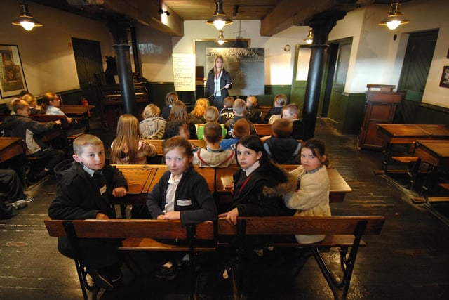 Pupils from Wharton Primary School with teacher Suzanne Slaven in the school room.