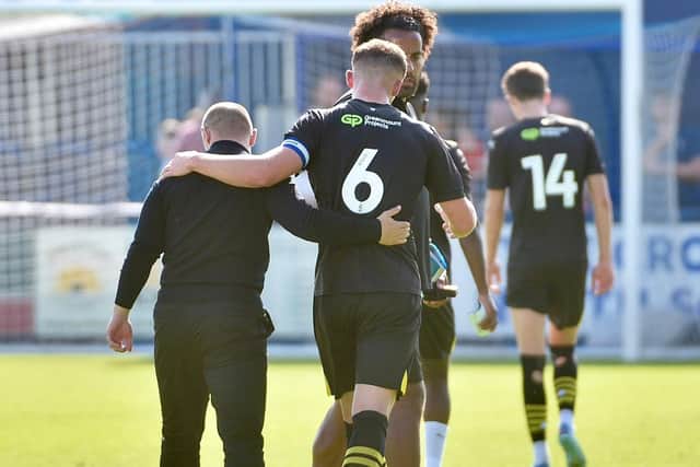 Charlie Hughes and Shaun Maloney leave the pitch at Barrow together - hopefully not for the last time