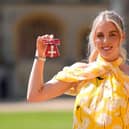 Keely Hodgkinson, 23, after being made a Member of the Order of the British Empire (MBE) by the Prince of Wales during an Investiture ceremony at Windsor Castle