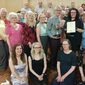 Pictured with the trophy are members of the Gondoliers cast and directors David Kay and Johanna Hassouna-Smith.