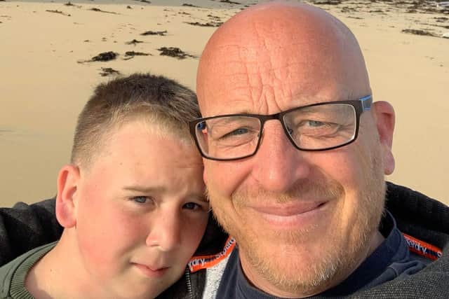 Rob Adams, 51, from Orrell, pictured with son Jacob, 12, who has a range of complex medical needs requiring a minibus to take him to and from the school he attends