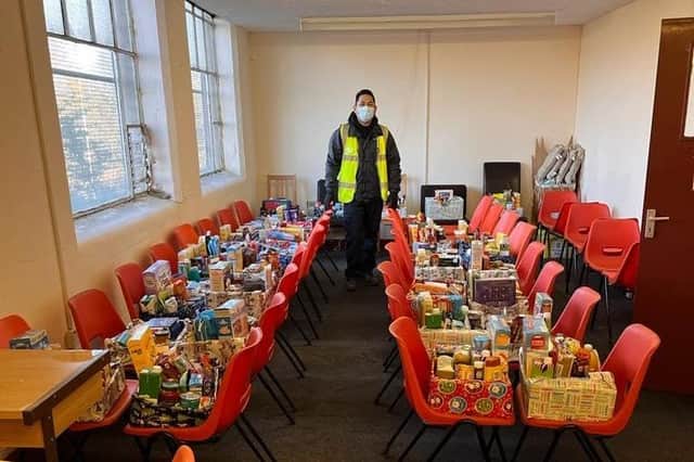 Volunteers with hampers last year.
