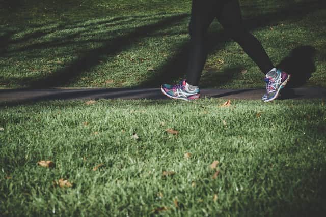 Walking photo by Arek Adeoye on Unsplash