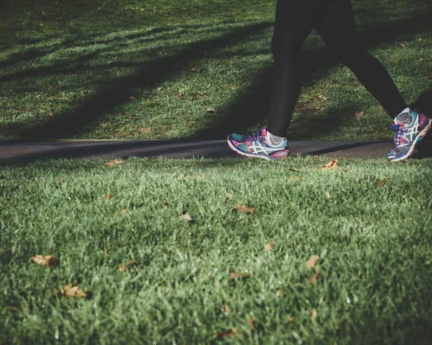 Walking photo by Arek Adeoye on Unsplash