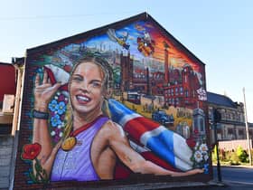 Members of the public joined local councillors and the artists, next to the Atherton mural, depicting Olympic, World and European medal-winning Athlete Keely Hodgkinson, on Church Street, Atherton.