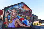 Members of the public joined local councillors and the artists, next to the Atherton mural, depicting Olympic, World and European medal-winning Athlete Keely Hodgkinson, on Church Street, Atherton.