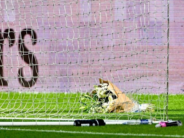 Wycombe laid this wreath behind the goal in front of the South Stand prior to an emotional game at the Brick