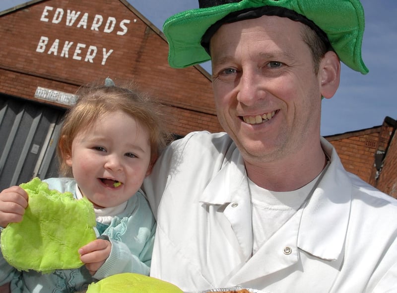 2009 - Duncan Edwards, of Edwards Bakery, Platt Bridge, and daughter Takira, two, with the Irish stew pies and green barm cakes to celebrate St Patrick's Day.
