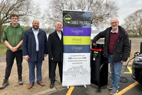 Pennington Flash team member Tai Scott, AMP EV lead project manager Ben Mulholland, Charge My Street project manager Eamonn Hennessy, and Deputy Leader of Wigan Council Cllr Keith Cunliffe