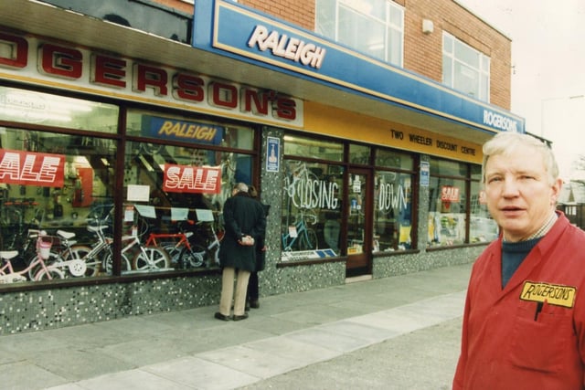 1990s Don Rogerson outside his two wheeler discount store in Orrell